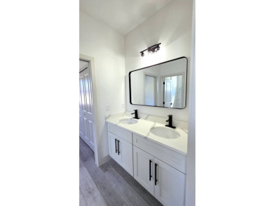 This home has the perfect blend of luxury and comfort, open on Rotonda Golf and Country Club - Long Marsh  in Florida - for sale on GolfHomes.com, golf home, golf lot