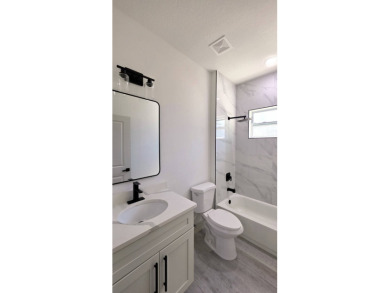 This home has the perfect blend of luxury and comfort, open on Rotonda Golf and Country Club - Long Marsh  in Florida - for sale on GolfHomes.com, golf home, golf lot