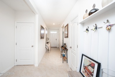 Immaculate 2023 Cali Model in Halifax Plantation. Smart home on Halifax Plantation Golf Club in Florida - for sale on GolfHomes.com, golf home, golf lot