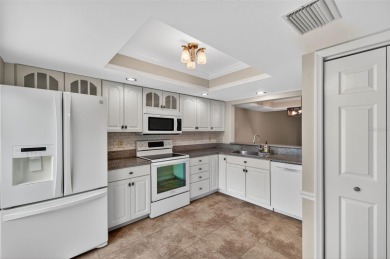 One or more photo(s) has been virtually staged. Welcome Home to on Feather Sound Country Club in Florida - for sale on GolfHomes.com, golf home, golf lot