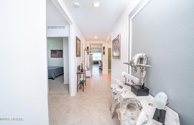 Immaculate 2023 Cali Model in Halifax Plantation. Smart home on Halifax Plantation Golf Club in Florida - for sale on GolfHomes.com, golf home, golf lot