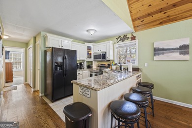 This 5-bedroom, 3-bathroom mountain retreat in the gated on Innsbruck Resort and Golf Club in Georgia - for sale on GolfHomes.com, golf home, golf lot