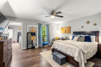 Secluded 3 bedroom 2 bath home surrounded on all 4 sides by on Holly Lake Ranch Golf Club in Texas - for sale on GolfHomes.com, golf home, golf lot