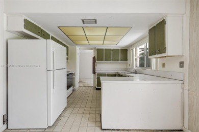 Discover your dream home in the sought-after neighborhood of on Killian Greens Golf Club in Florida - for sale on GolfHomes.com, golf home, golf lot