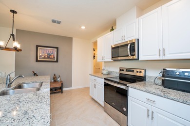 Immaculate 2023 Cali Model in Halifax Plantation. Smart home on Halifax Plantation Golf Club in Florida - for sale on GolfHomes.com, golf home, golf lot