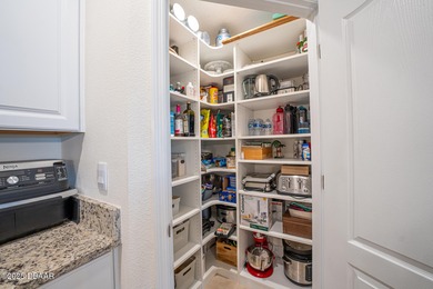 Immaculate 2023 Cali Model in Halifax Plantation. Smart home on Halifax Plantation Golf Club in Florida - for sale on GolfHomes.com, golf home, golf lot