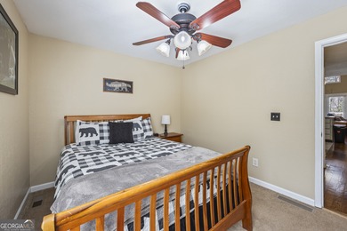 This 5-bedroom, 3-bathroom mountain retreat in the gated on Innsbruck Resort and Golf Club in Georgia - for sale on GolfHomes.com, golf home, golf lot