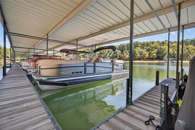 Covered boat slip on deep water! This move-in ready on Stone Creek Cove Golf Course in South Carolina - for sale on GolfHomes.com, golf home, golf lot