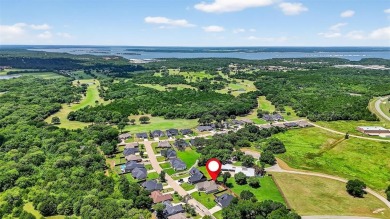 Live the Lake Life in Style at 38 Lone Oak Blvd, Pottsboro, TX on Tanglewood Resort in Texas - for sale on GolfHomes.com, golf home, golf lot
