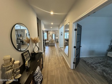 Welcome home to beautiful living in Lake Royale! This spacious on River Golf and Country Club at Lake Royale in North Carolina - for sale on GolfHomes.com, golf home, golf lot