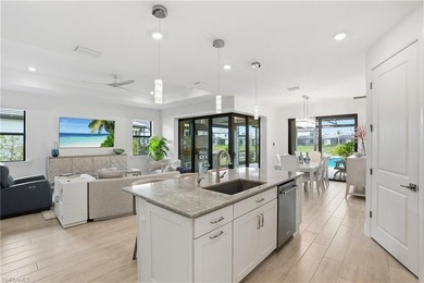 Located on a private cul-de-sac with water view in the highly on Valencia Golf and Country Club in Florida - for sale on GolfHomes.com, golf home, golf lot