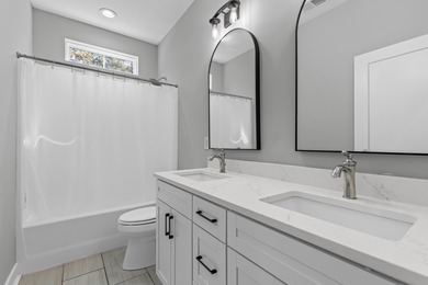 Welcome to 413 Renau Boulevard -- a stunning 4 bedroom, 2.5 bath on The Club at Pine Forest  in South Carolina - for sale on GolfHomes.com, golf home, golf lot