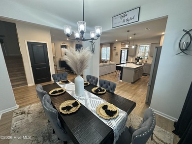 Welcome home to beautiful living in Lake Royale! This spacious on River Golf and Country Club at Lake Royale in North Carolina - for sale on GolfHomes.com, golf home, golf lot