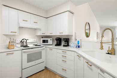 Turnkey, Fully Furnished  Income-Producing!  Welcome to this on Isla Del Sol Yacht and Country Club in Florida - for sale on GolfHomes.com, golf home, golf lot