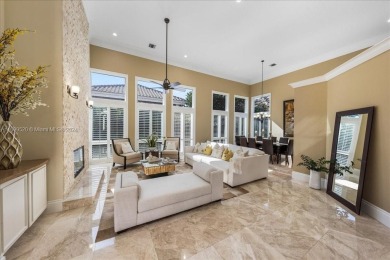 Two-story, 5-bedroom, 4.5-bath home on a corner lot in Seasons on Woodfield Country Club in Florida - for sale on GolfHomes.com, golf home, golf lot