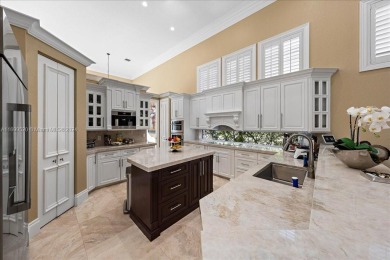 Two-story, 5-bedroom, 4.5-bath home on a corner lot in Seasons on Woodfield Country Club in Florida - for sale on GolfHomes.com, golf home, golf lot