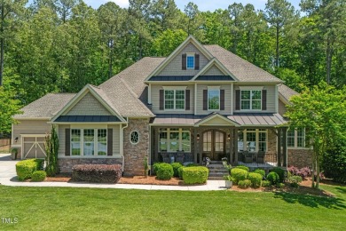 Welcome to this impeccably designed home in the sought-after on Hasentree Club in North Carolina - for sale on GolfHomes.com, golf home, golf lot