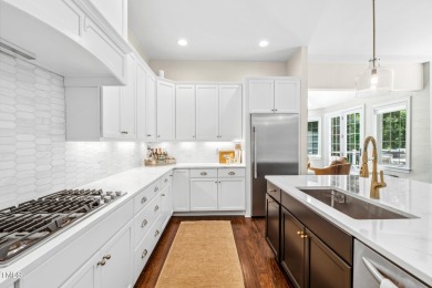 Welcome to this impeccably designed home in the sought-after on Hasentree Club in North Carolina - for sale on GolfHomes.com, golf home, golf lot