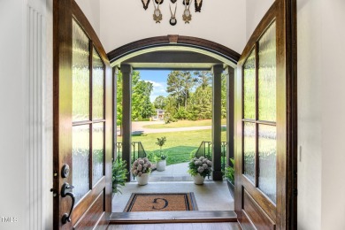 Welcome to this impeccably designed home in the sought-after on Hasentree Club in North Carolina - for sale on GolfHomes.com, golf home, golf lot