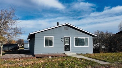 Welcome to 504 E. Fir St., where modern comfort meets small-town on Headwaters Golf Course in Montana - for sale on GolfHomes.com, golf home, golf lot