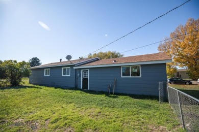 Welcome to 504 E. Fir St., where modern comfort meets small-town on Headwaters Golf Course in Montana - for sale on GolfHomes.com, golf home, golf lot