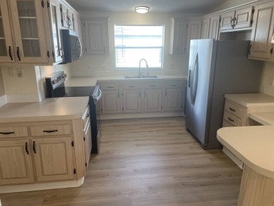 The Lot Rent for this home is $1,342.00/monthly.  This Del Tura on Del Tura Golf and Country Club in Florida - for sale on GolfHomes.com, golf home, golf lot