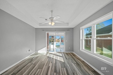 Live lakefront at Leisure Lake, a coveted Foley community where on Glenlakes Golf Club in Alabama - for sale on GolfHomes.com, golf home, golf lot