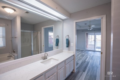 Live lakefront at Leisure Lake, a coveted Foley community where on Glenlakes Golf Club in Alabama - for sale on GolfHomes.com, golf home, golf lot