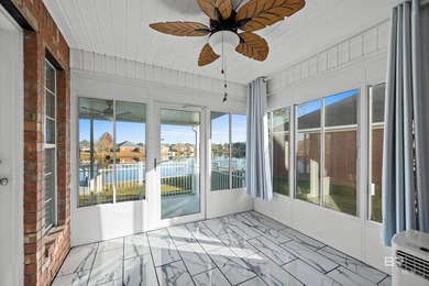 Live lakefront at Leisure Lake, a coveted Foley community where on Glenlakes Golf Club in Alabama - for sale on GolfHomes.com, golf home, golf lot