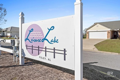 Live lakefront at Leisure Lake, a coveted Foley community where on Glenlakes Golf Club in Alabama - for sale on GolfHomes.com, golf home, golf lot