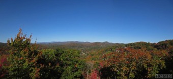 This .78+/- acre lot offers beautiful long rang mountain views on  in North Carolina - for sale on GolfHomes.com, golf home, golf lot