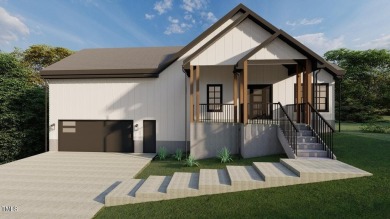 Welcome to 101 Cochise Cove, a 3-bedroom, 3.5-bath home with 3 on River Golf and County Club at Lake Royale in North Carolina - for sale on GolfHomes.com, golf home, golf lot