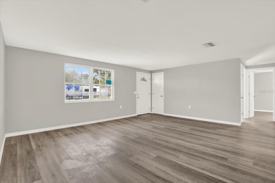 Under contract-accepting backup offers. NEW ROOF & POOL DREAM on Beacon Woods Golf Club in Florida - for sale on GolfHomes.com, golf home, golf lot