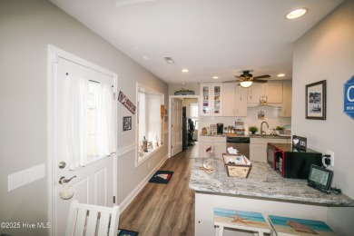 Discover island luxury at its finest in this beautifully updated on Founders Club At St. James Plantation in North Carolina - for sale on GolfHomes.com, golf home, golf lot