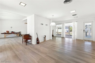 Mid-Century Modern Coastal Retreat in Cape Haze West Nestled in on Rotonda Golf and Country Club The Links Course in Florida - for sale on GolfHomes.com, golf home, golf lot