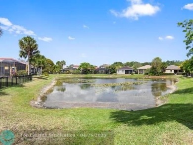Welcome to this stunning three-bedroom, two-and-a-half-bathroom on Heron Bay Golf Club in Florida - for sale on GolfHomes.com, golf home, golf lot