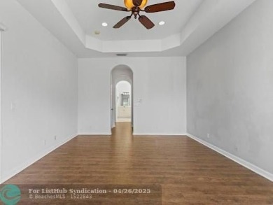 Welcome to this stunning three-bedroom, two-and-a-half-bathroom on Heron Bay Golf Club in Florida - for sale on GolfHomes.com, golf home, golf lot