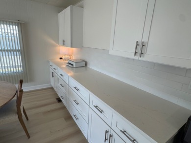 This elegantly updated 1973 home offers modern charm and on Heather Hills Golf Course in Florida - for sale on GolfHomes.com, golf home, golf lot