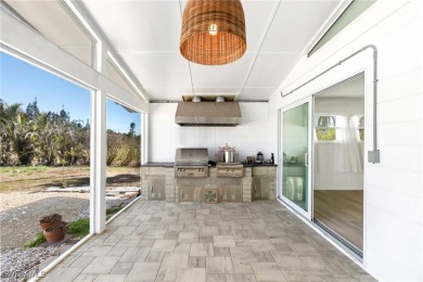 Mid-Century Modern Coastal Retreat in Cape Haze West Nestled in on Rotonda Golf and Country Club The Links Course in Florida - for sale on GolfHomes.com, golf home, golf lot