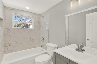 Under contract-accepting backup offers. NEW ROOF & POOL DREAM on Beacon Woods Golf Club in Florida - for sale on GolfHomes.com, golf home, golf lot