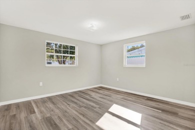 Under contract-accepting backup offers. NEW ROOF & POOL DREAM on Beacon Woods Golf Club in Florida - for sale on GolfHomes.com, golf home, golf lot