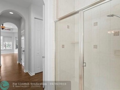 Welcome to this stunning three-bedroom, two-and-a-half-bathroom on Heron Bay Golf Club in Florida - for sale on GolfHomes.com, golf home, golf lot
