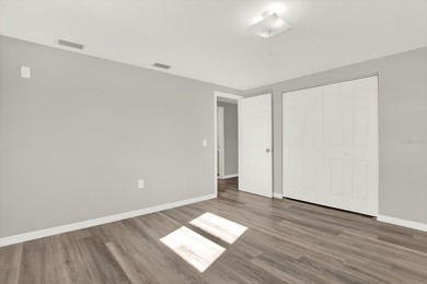 Under contract-accepting backup offers. NEW ROOF & POOL DREAM on Beacon Woods Golf Club in Florida - for sale on GolfHomes.com, golf home, golf lot