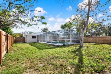 Under contract-accepting backup offers. NEW ROOF & POOL DREAM on Beacon Woods Golf Club in Florida - for sale on GolfHomes.com, golf home, golf lot