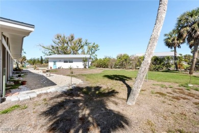 Mid-Century Modern Coastal Retreat in Cape Haze West Nestled in on Rotonda Golf and Country Club The Links Course in Florida - for sale on GolfHomes.com, golf home, golf lot