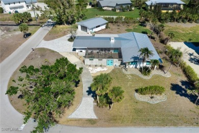 Mid-Century Modern Coastal Retreat in Cape Haze West Nestled in on Rotonda Golf and Country Club The Links Course in Florida - for sale on GolfHomes.com, golf home, golf lot