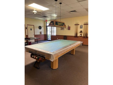 Discover the perfect blend of comfort and lifestyle in this 2/2 on Cypress Lakes Golf Course - West Palm Beach in Florida - for sale on GolfHomes.com, golf home, golf lot