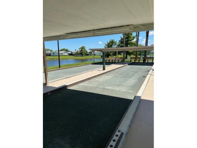Discover the perfect blend of comfort and lifestyle in this 2/2 on Cypress Lakes Golf Course - West Palm Beach in Florida - for sale on GolfHomes.com, golf home, golf lot