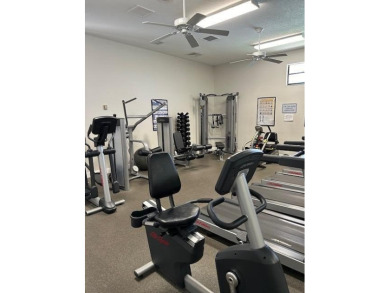 Discover the perfect blend of comfort and lifestyle in this 2/2 on Cypress Lakes Golf Course - West Palm Beach in Florida - for sale on GolfHomes.com, golf home, golf lot