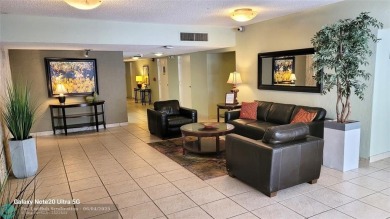 QUIET COZY RARELY AVAILABLE 2/2 KING OVERSIZED PENTHOUSE W/ENCL on Palm-Aire Country Club and Resort - The Oaks in Florida - for sale on GolfHomes.com, golf home, golf lot